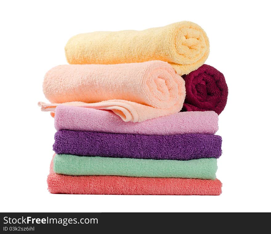 The combined colour towels isolated on white