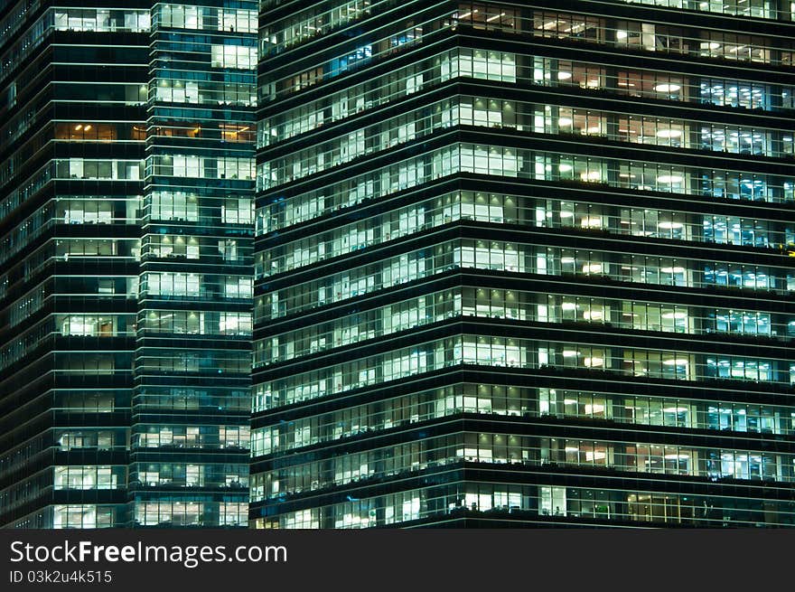 An abstract of commercial building skyscraper glass window with detail of levels. An abstract of commercial building skyscraper glass window with detail of levels