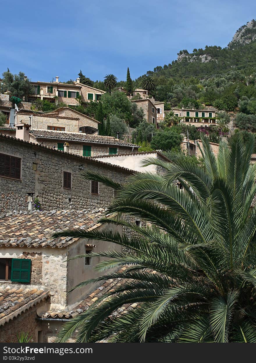 Typical mediterranean historic mountain village of Deia in Tramuntana mountains (Mallorca, Spain). Typical mediterranean historic mountain village of Deia in Tramuntana mountains (Mallorca, Spain).