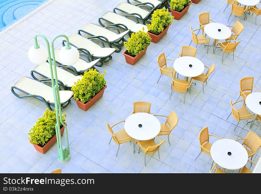 Empty caffee near the swiming pool in the summer