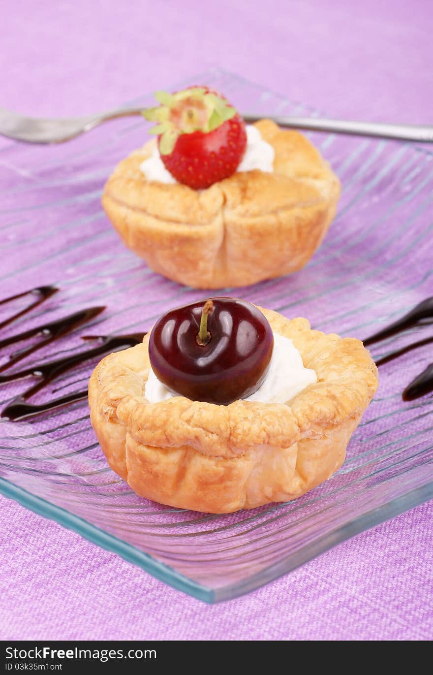 Fruit tarts with whipped cream