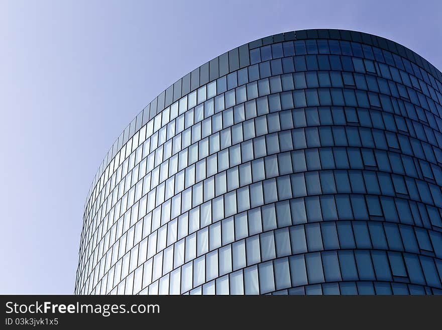 A modern glass facade with an almost irritating pattern