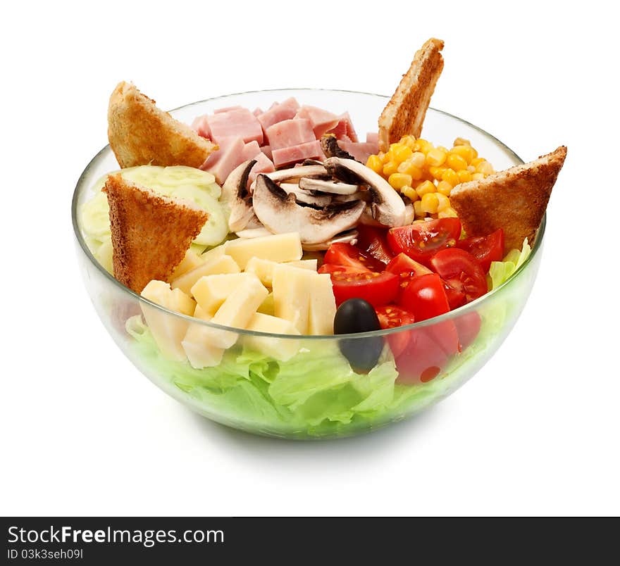 A bowl with fresh vegetables, ham and toasts. A bowl with fresh vegetables, ham and toasts