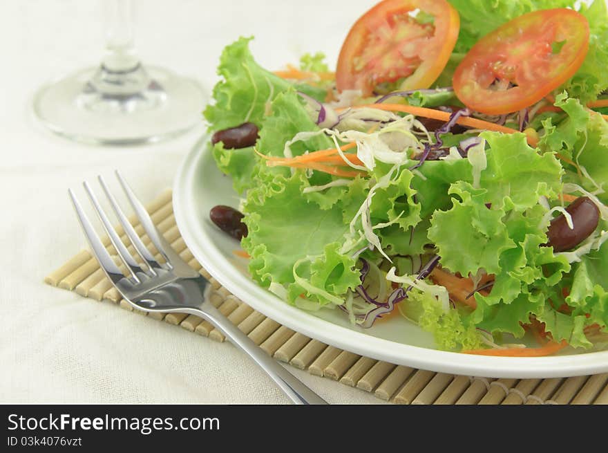 Fresh salad on diner table