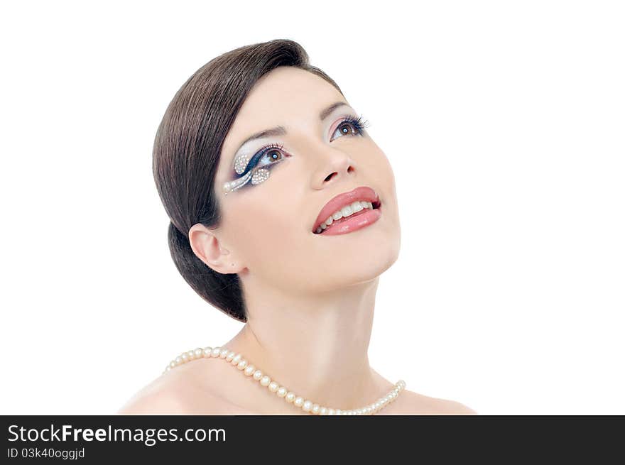 Portrait of beautiful girl with elegant coiffure and art make up on white. Portrait of beautiful girl with elegant coiffure and art make up on white