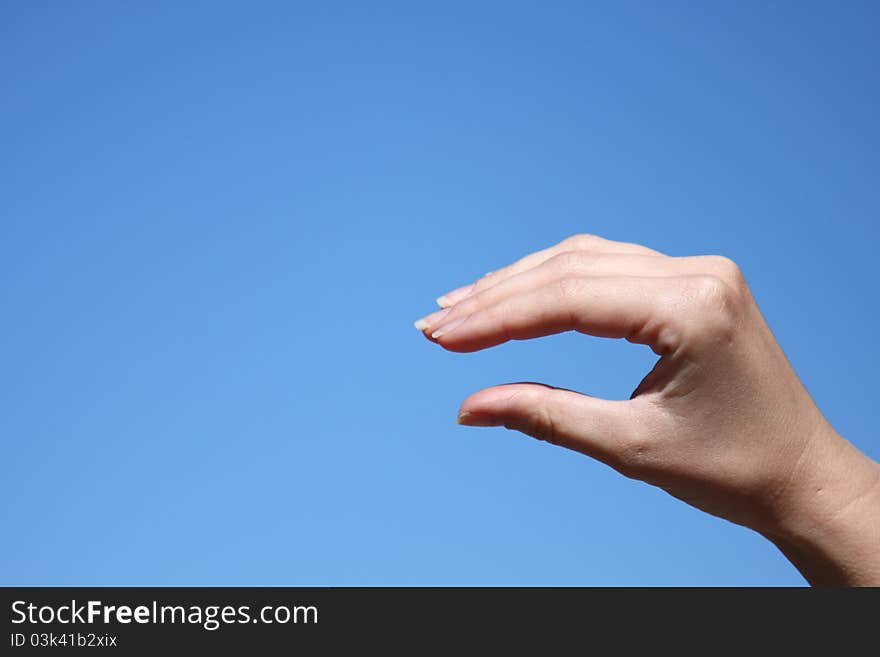 Hand and the sky background