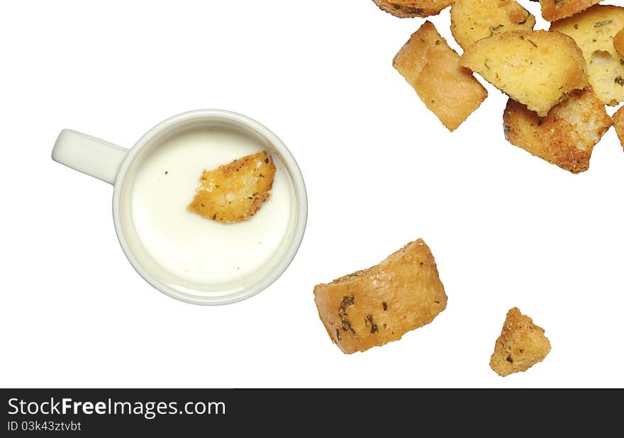 Closeup of delicious bread croutons and milk