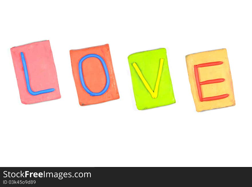 Clay letters. Words LOVE isolated on the white background