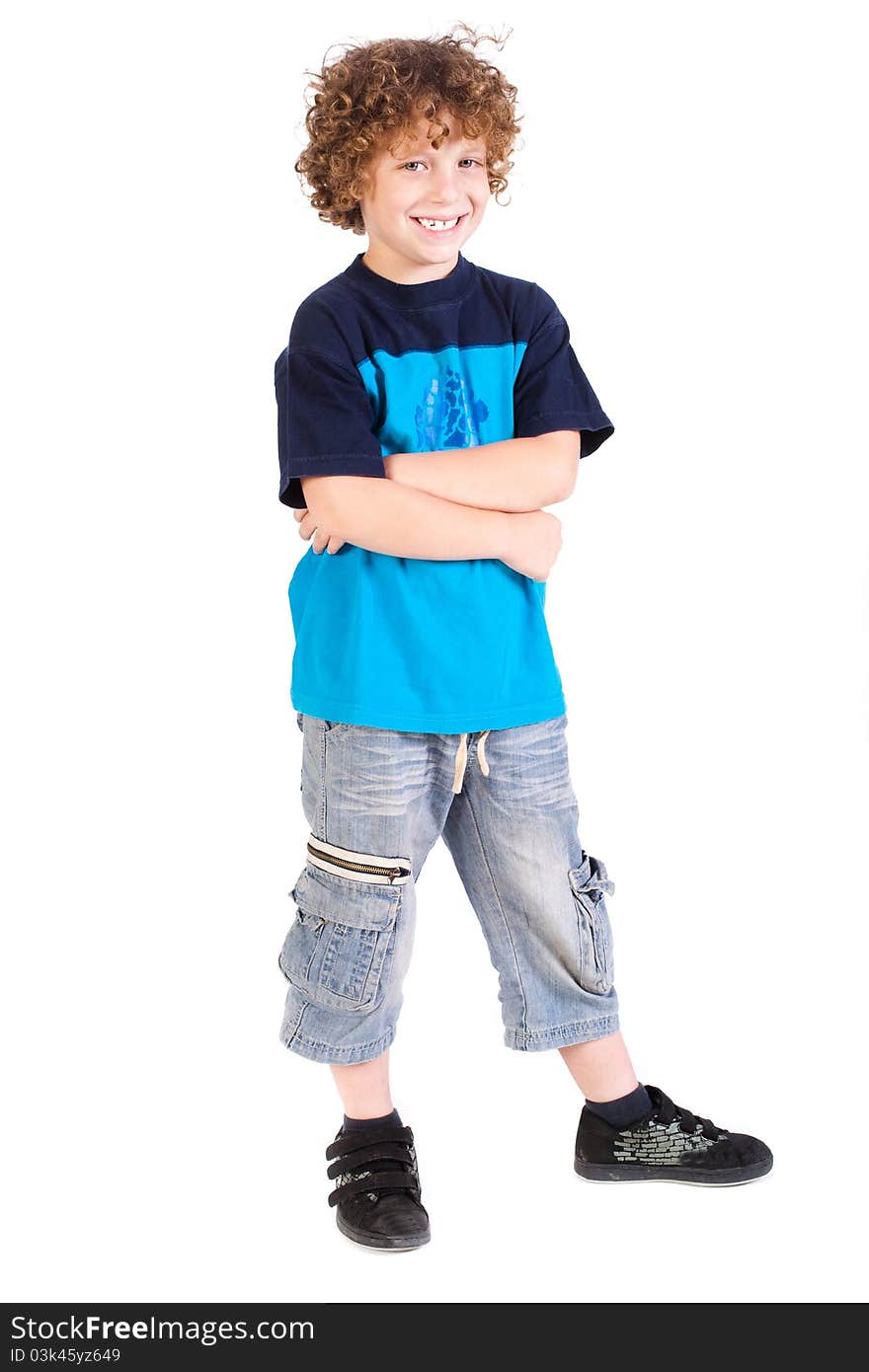 Young preschool boy posing with arms crossed isolated on white background. Young preschool boy posing with arms crossed isolated on white background...