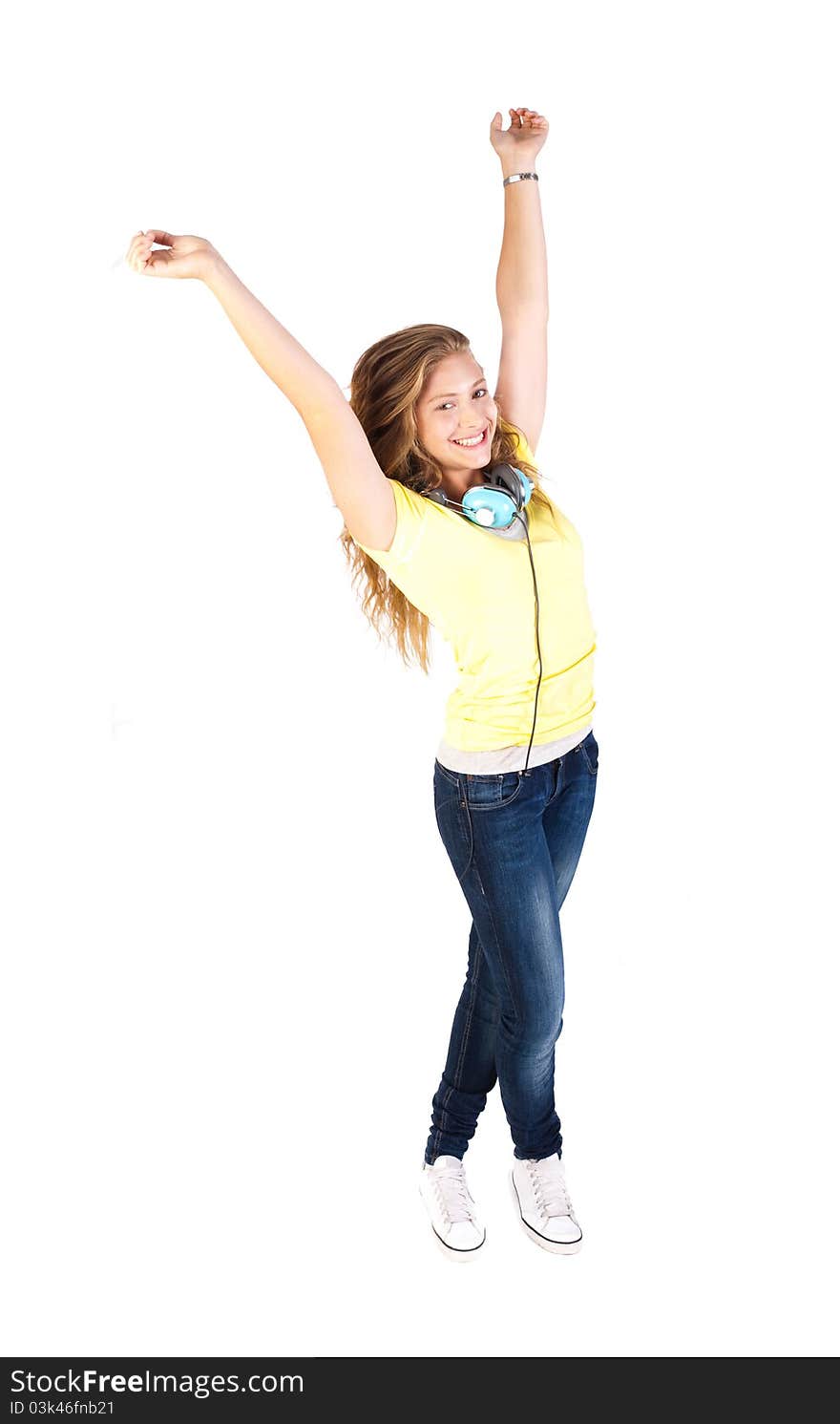 Happy young woman enjoying music against white background. Happy young woman enjoying music against white background.