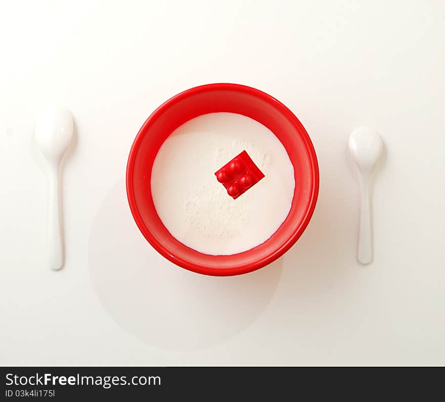 Spoon And Red Bowl