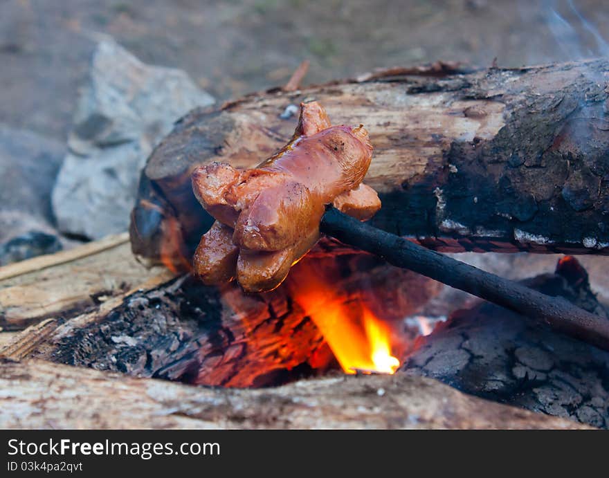 Sausage on campfire