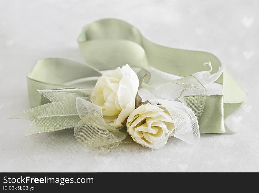 Soft roses with satin and voile ribbon with heart texture . Shallow DOF. Soft roses with satin and voile ribbon with heart texture . Shallow DOF