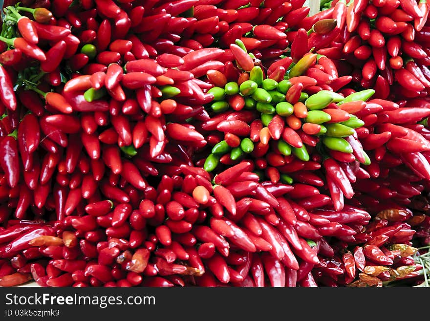 Many chilli peppers at the market