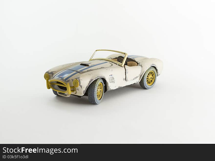 Studio photo of a vintage racing toy car. Studio photo of a vintage racing toy car