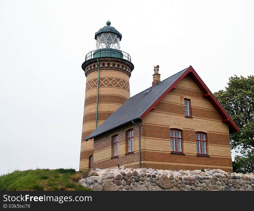 Lighthouse in classical design taken in a low angle