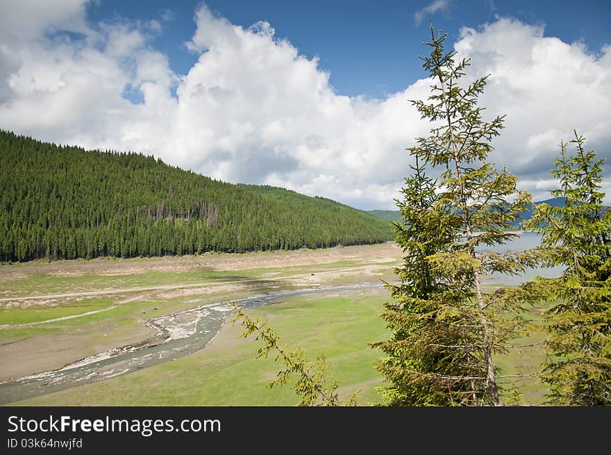 Serene mountain landscape in a green valley