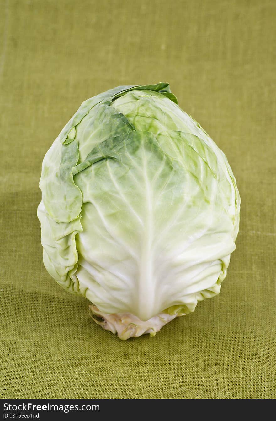 A beautiful cabbage isolated on green