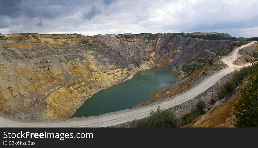 Open pit on copper mine and artificial lake. Open pit on copper mine and artificial lake.