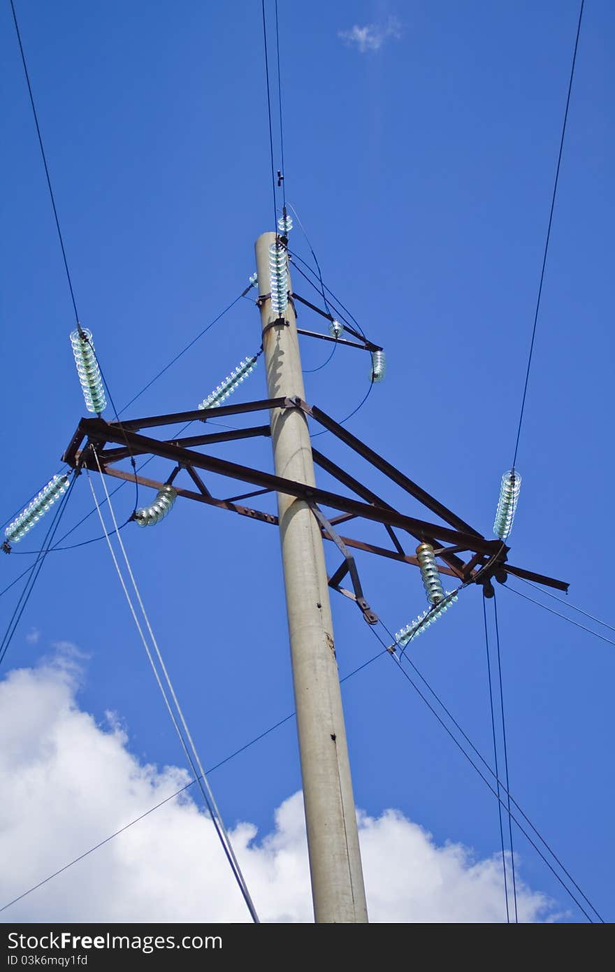 Industrial Power Transmission Lines in the Desert with Blue Sky