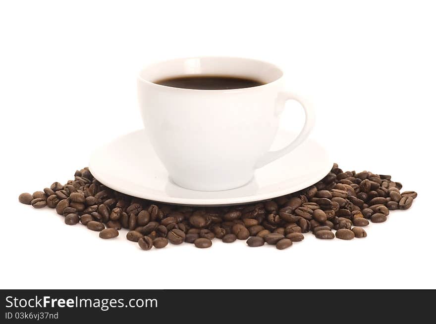 Cup of coffee and coffee beans