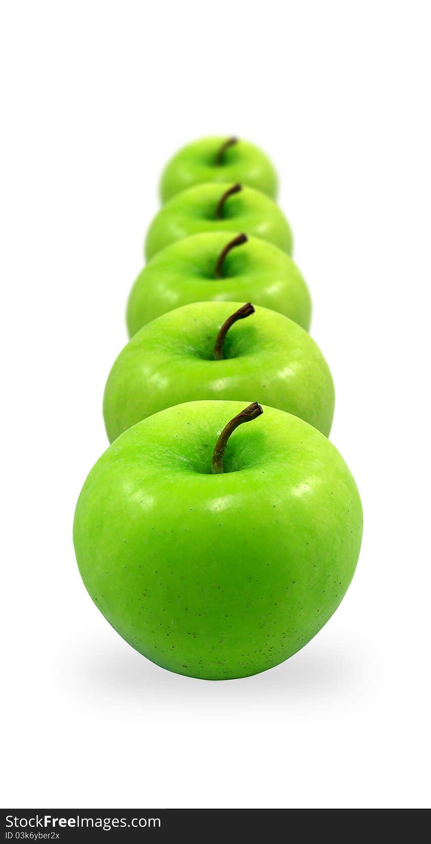 Green apple on the white background