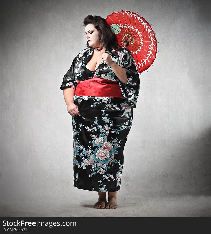 Fat woman disguised as a geisha. Fat woman disguised as a geisha