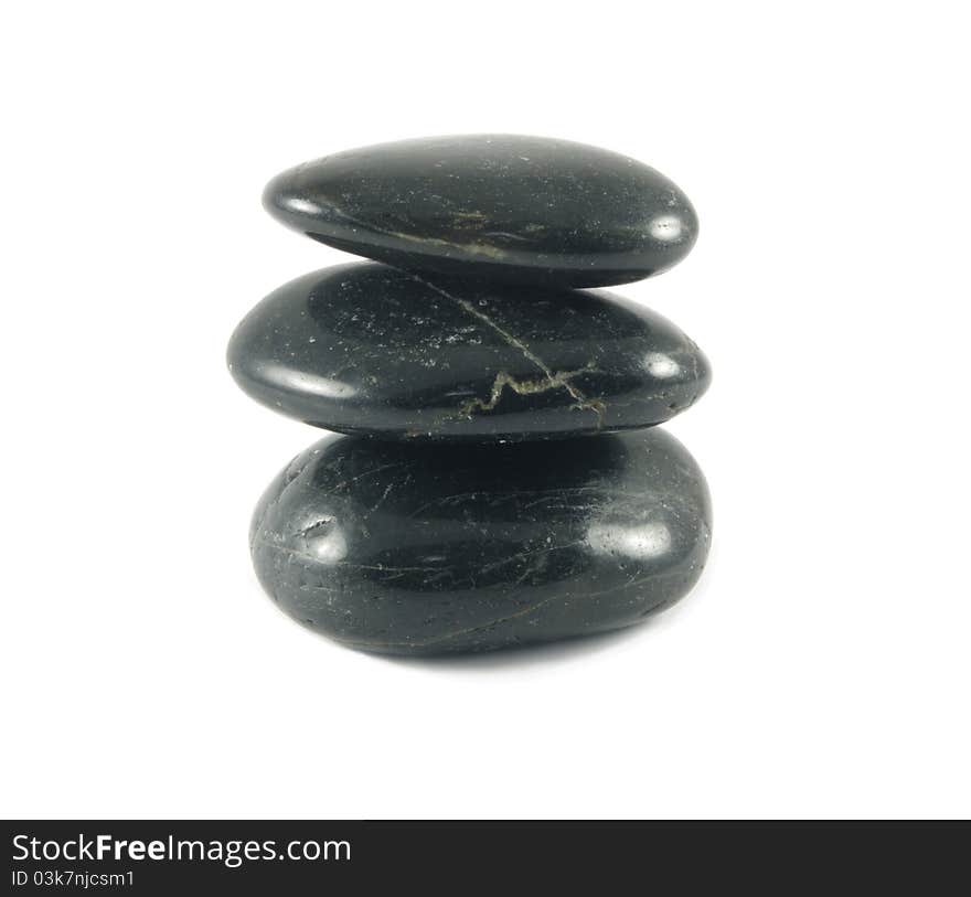 Three spa black stones closeup. Three spa black stones closeup