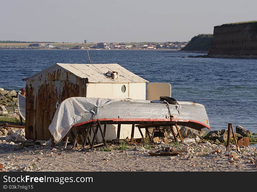 Old barrack and boat