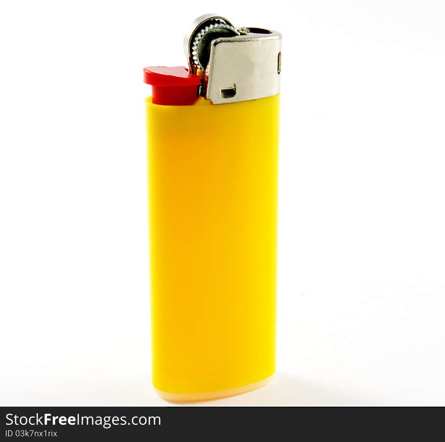 Yellow lighter closeup on white