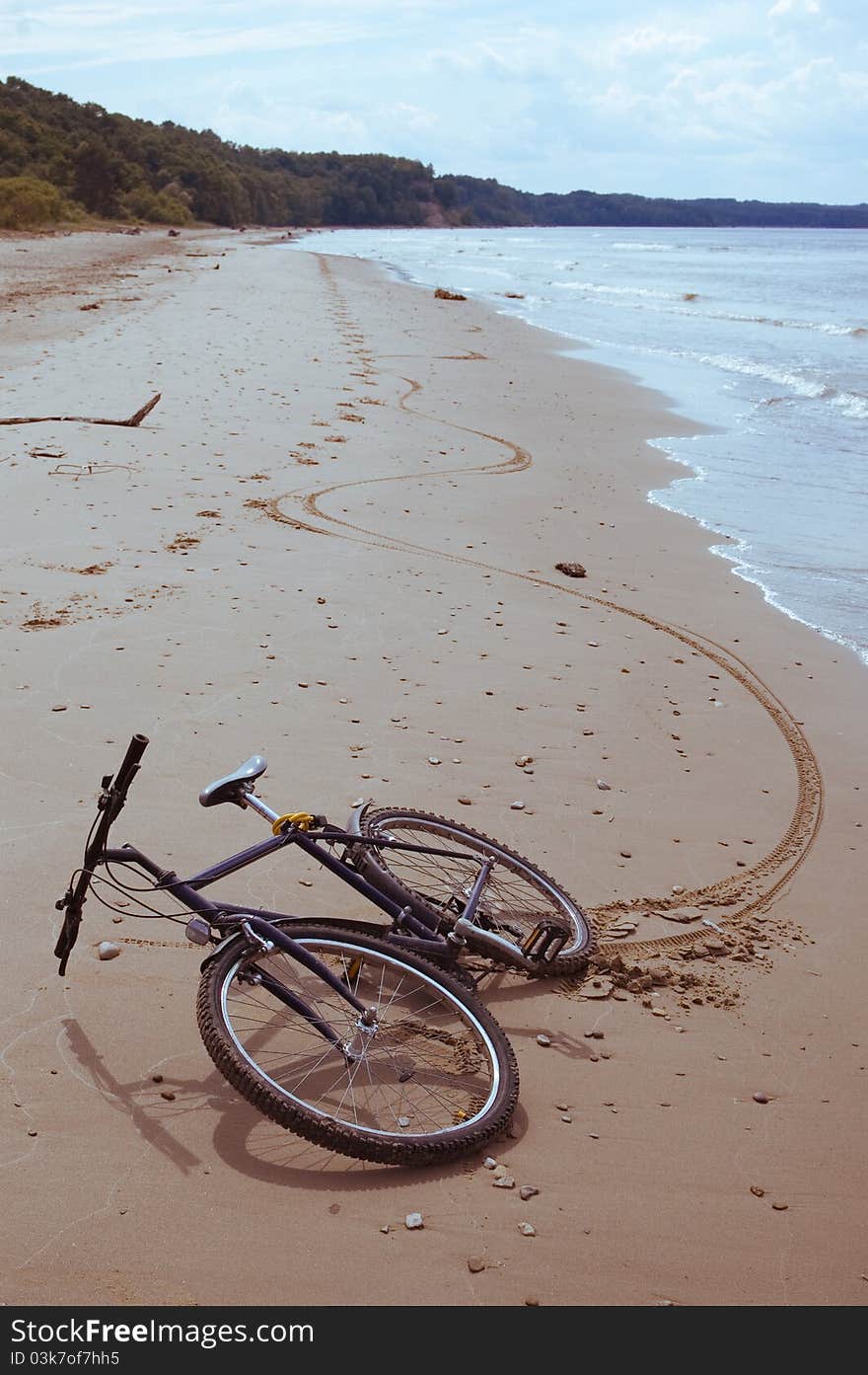 Riding a bicycle on beach. Riding a bicycle on beach