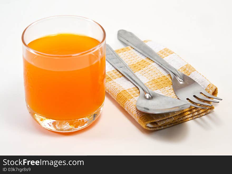 Set of spoon and orange  juice. Set of spoon and orange  juice