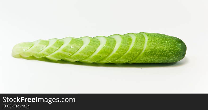 Cucumber and slices isolated on white background. Cucumber and slices isolated on white background.