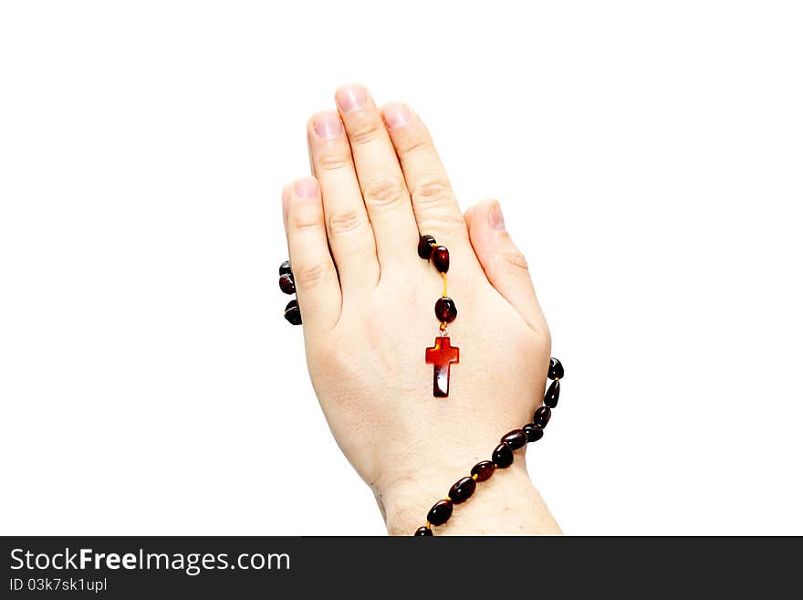 Hands with rosary isolated on white