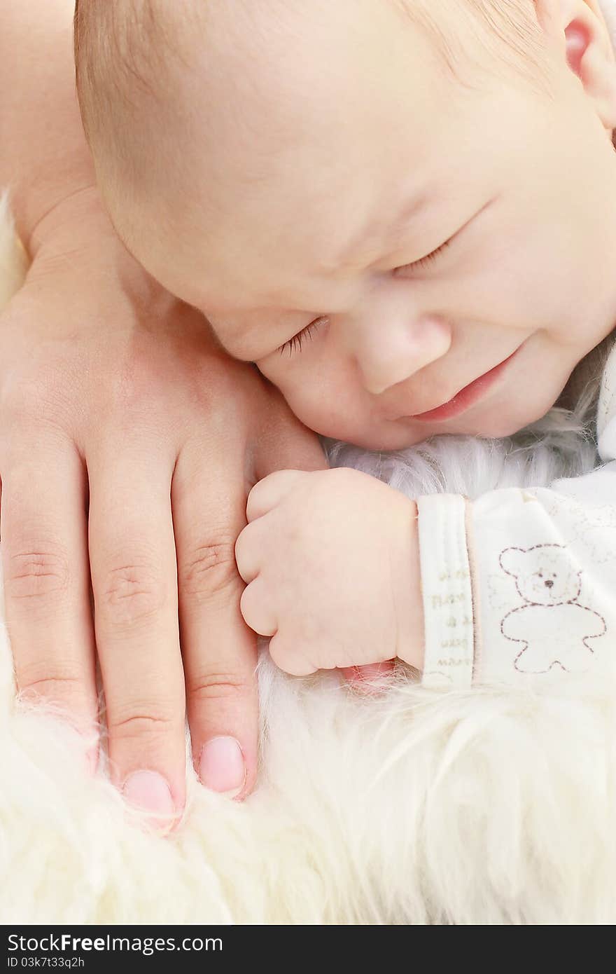 Close-up Of Cute Small Boy With Mother Hand