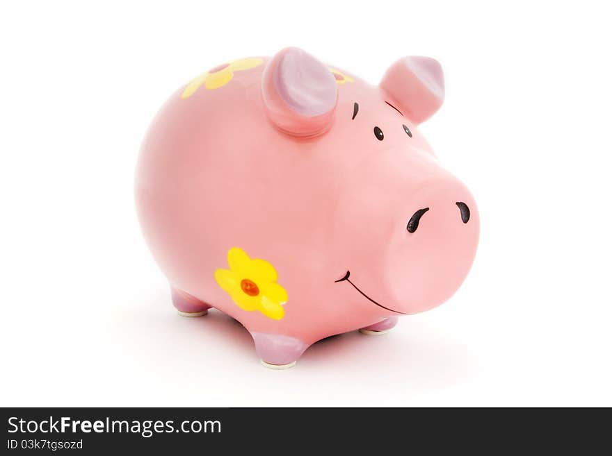 Pink Piggy bank with yellow flowers on white