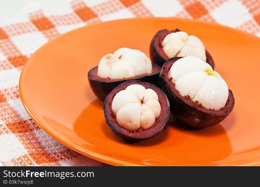 Mangosteen isolated on white background.