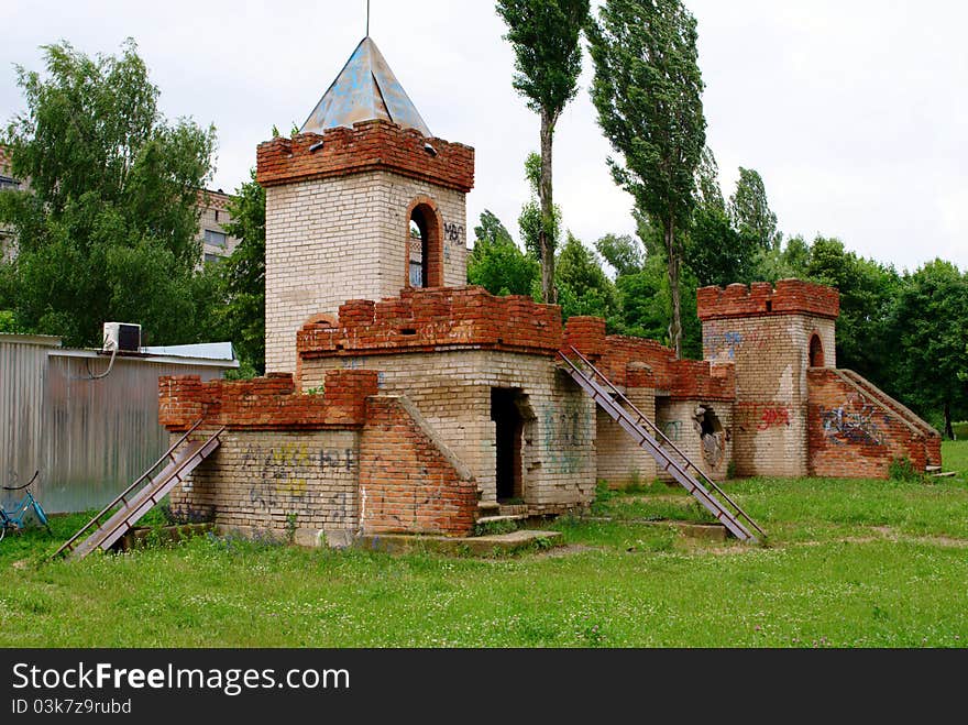 Building of brick in the form of an old castle