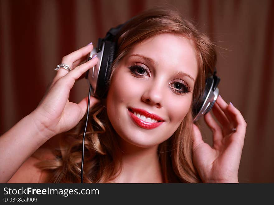 Young Woman Listening To Music