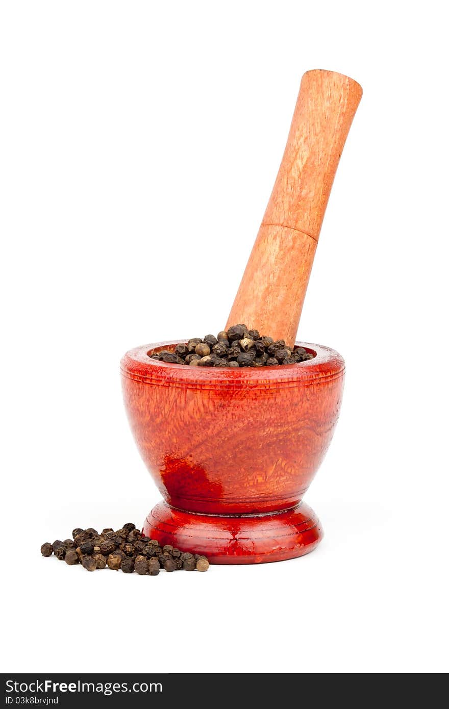 Wooden mortar, pestle,and pepper