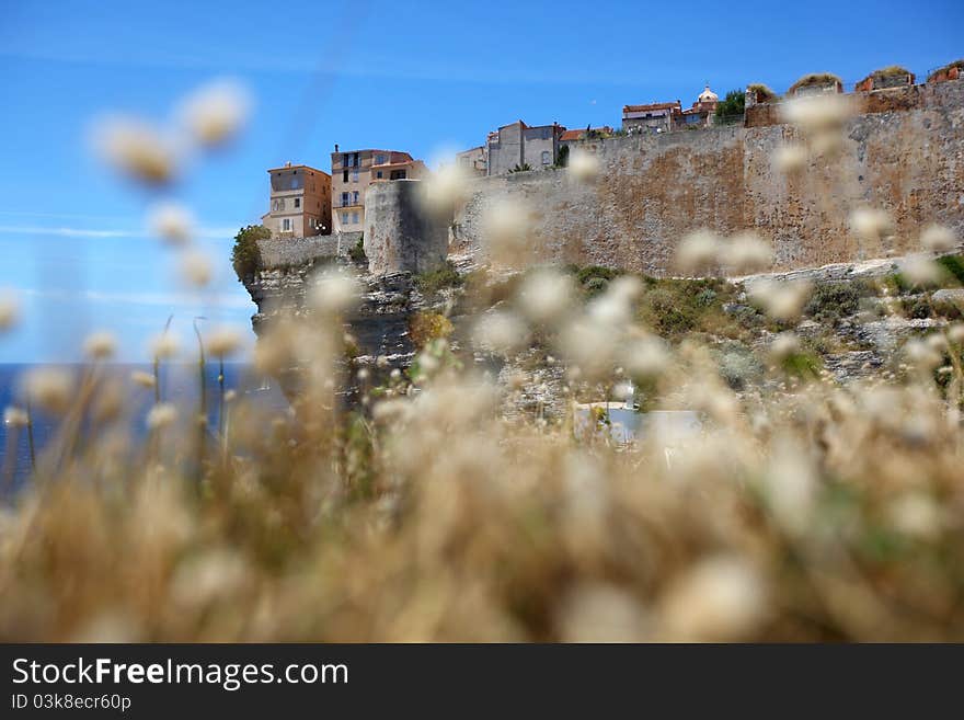 Cliff top castle against blue sky