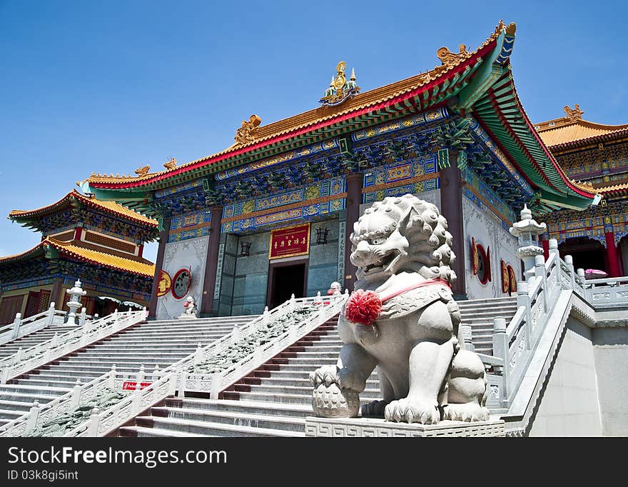 Lion statue in front of Chinese Temple. Lion statue in front of Chinese Temple