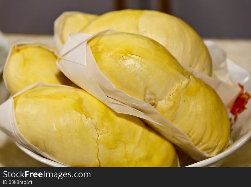 Close up of peeled durian with paper wrap. Close up of peeled durian with paper wrap