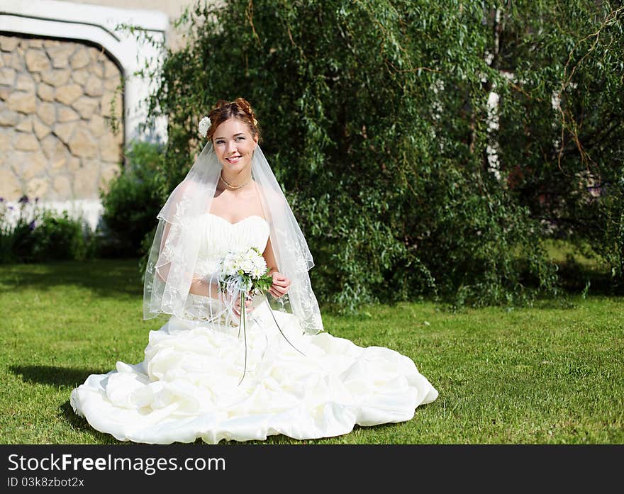 Portrait Of A Young Bride In A White Dress