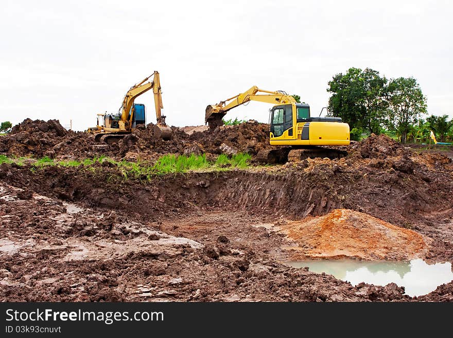 Excavators digging the soil are quite