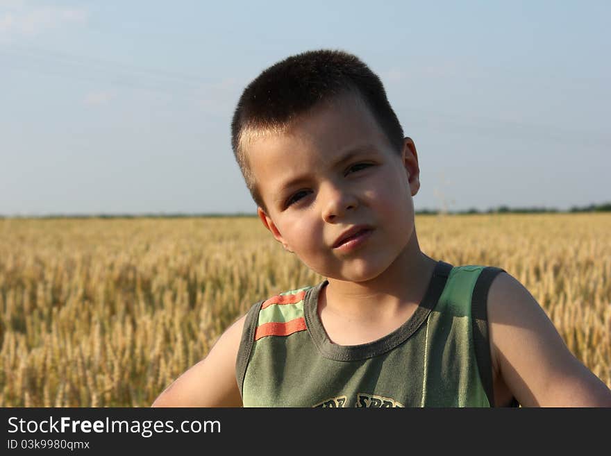 Little Boy In Field