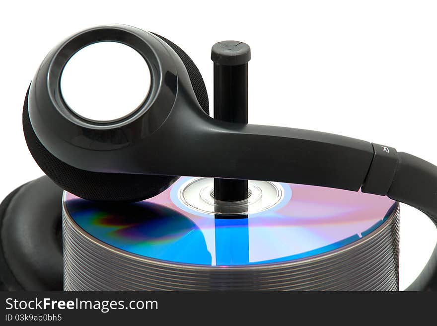 Stack of DVDs with headphones