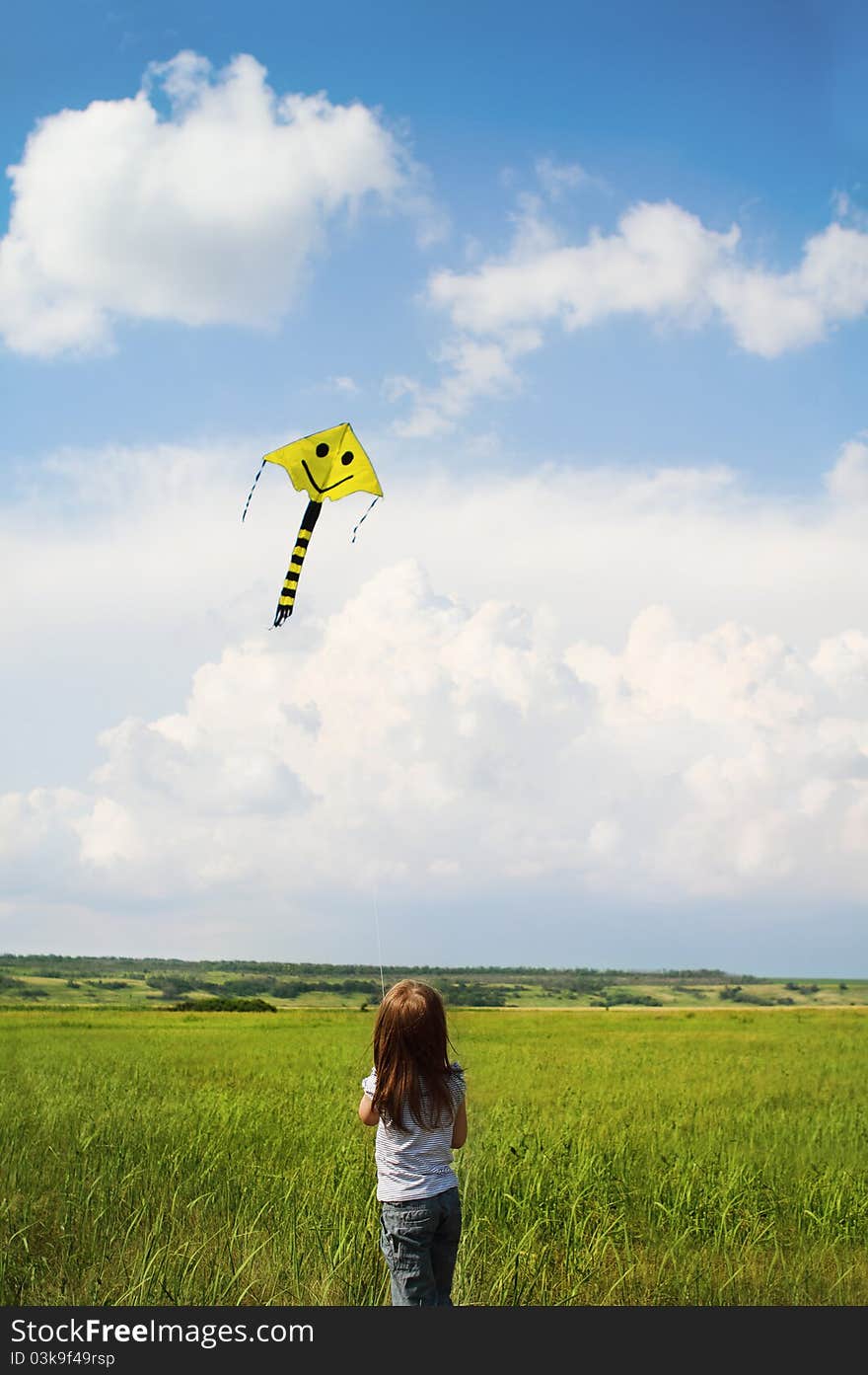 Little Girl With Flying A Kite