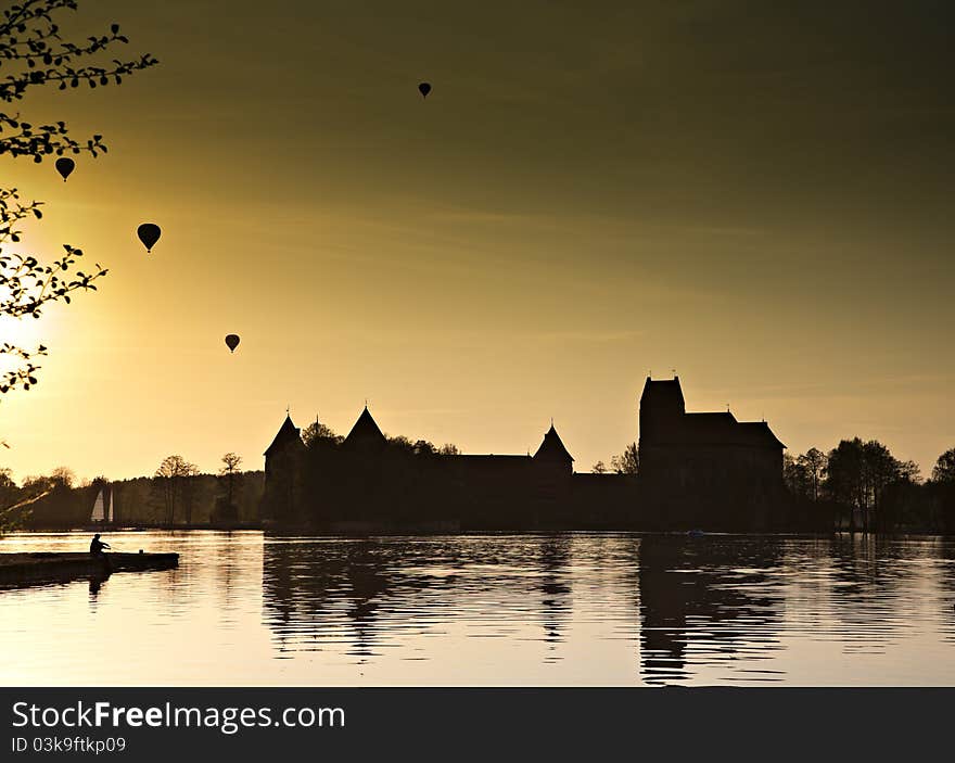 Air Balloon Over The Lake In Night.