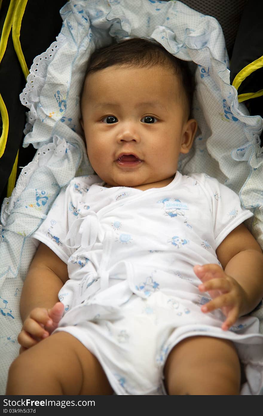 Portrait of Thai baby looking at camera